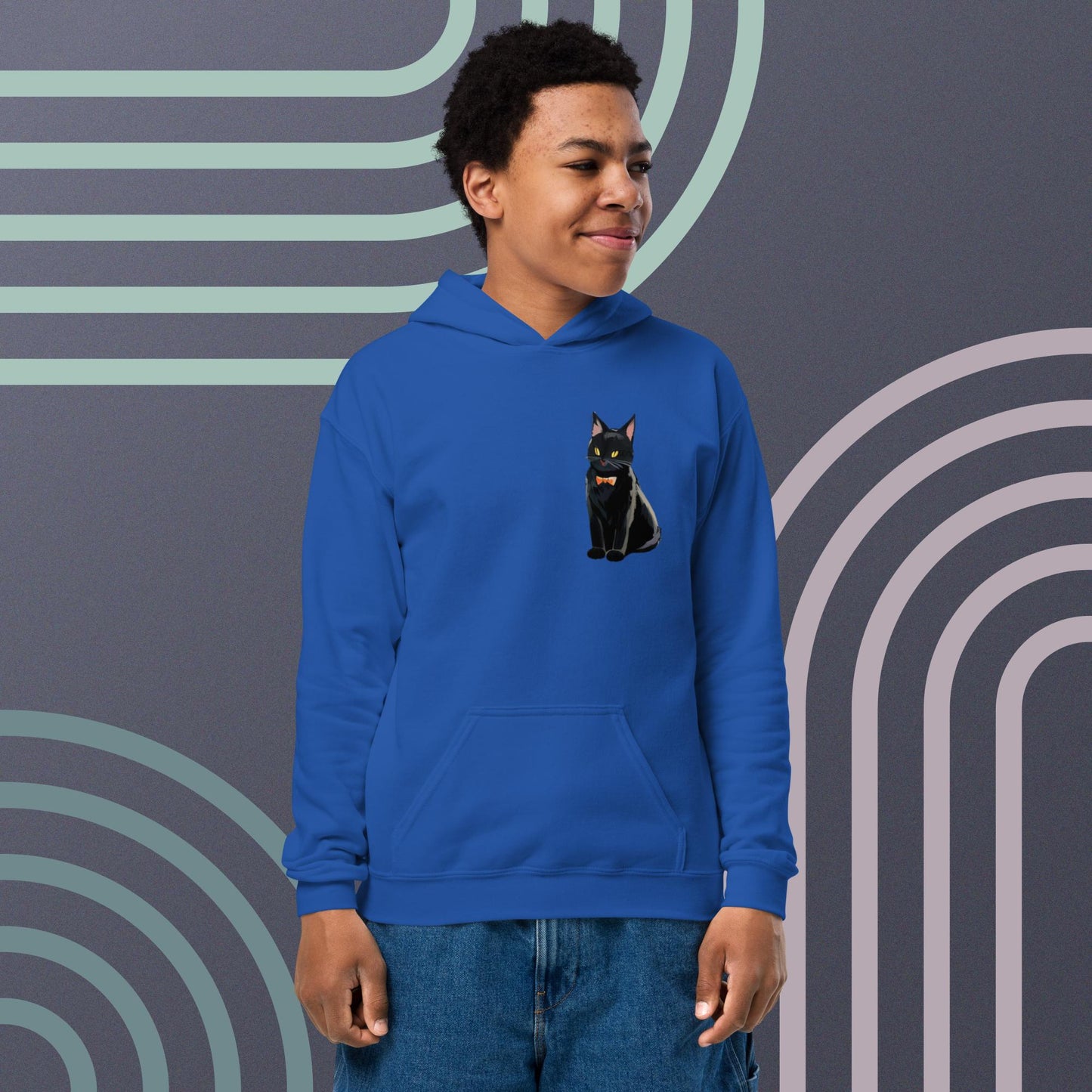 Youth heavy blend hoodie with Black cat in left pocket.